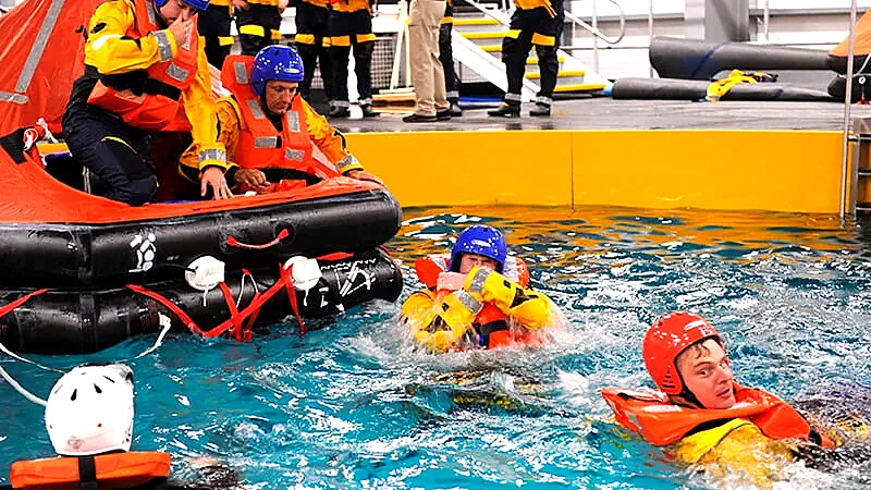 Participants in a supervised sea-survival training pool exercise